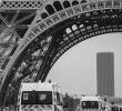 Jardin Du Kohistan Élégant Police Cars Moving Under Eiffel tower Paris During Day